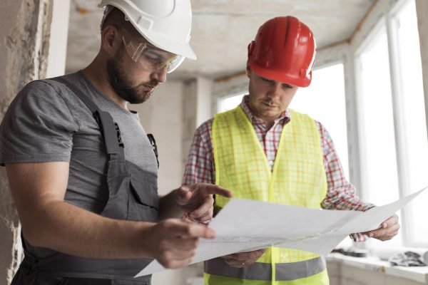 medium-shot-men-looking-project medium-shot-men-looking-project
